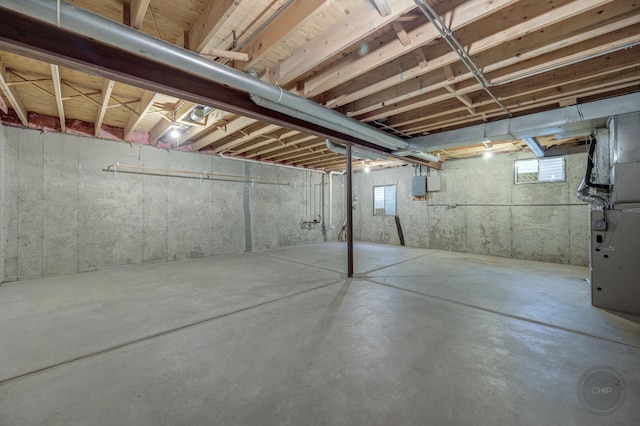 basement featuring electric panel