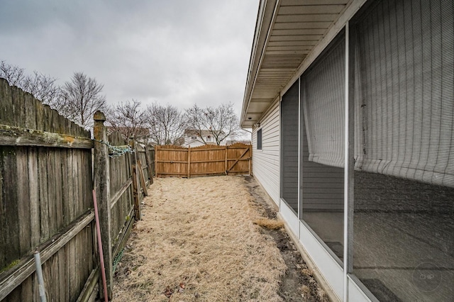 view of yard with a fenced backyard