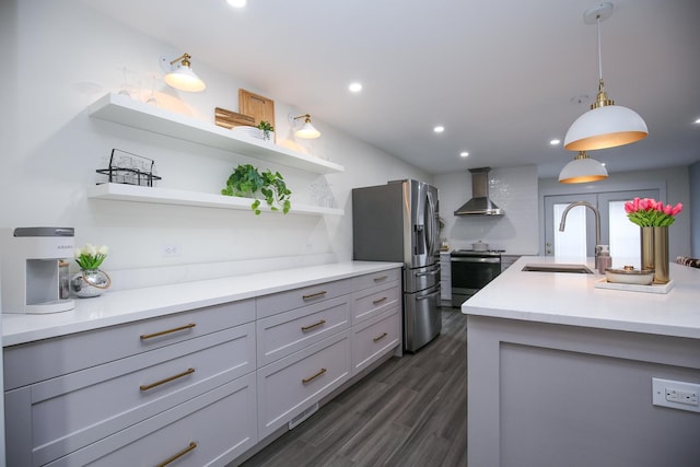 kitchen featuring open shelves, a sink, electric stove, wall chimney exhaust hood, and stainless steel fridge