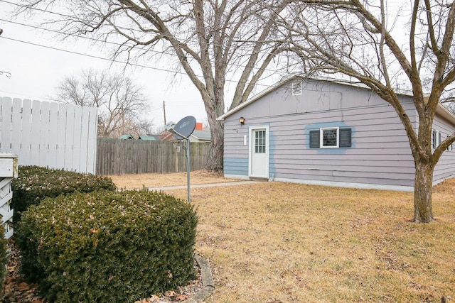 view of outbuilding with fence