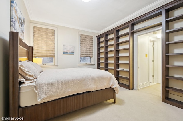 carpeted bedroom with crown molding