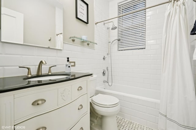 bathroom with shower / bath combo, toilet, tile walls, and vanity