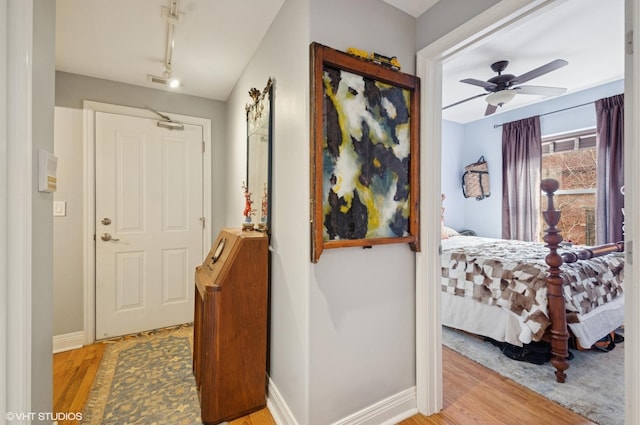 entrance foyer featuring light wood-type flooring, baseboards, and visible vents