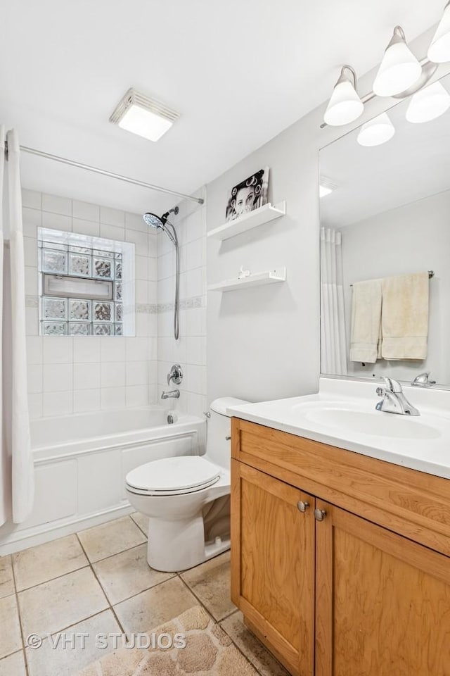 full bathroom with shower / tub combo, tile patterned flooring, vanity, and toilet