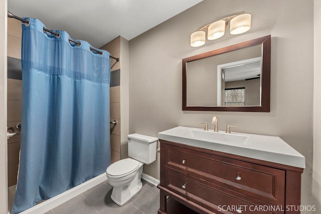 full bathroom featuring toilet, a shower with curtain, tile patterned flooring, and vanity