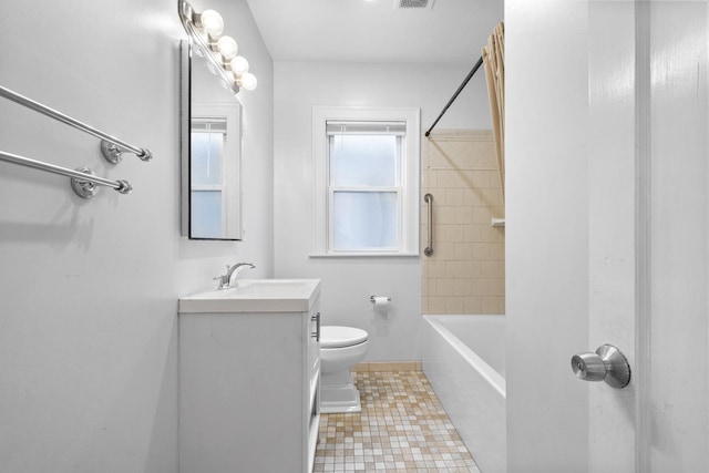 bathroom featuring toilet, bathtub / shower combination, visible vents, and vanity