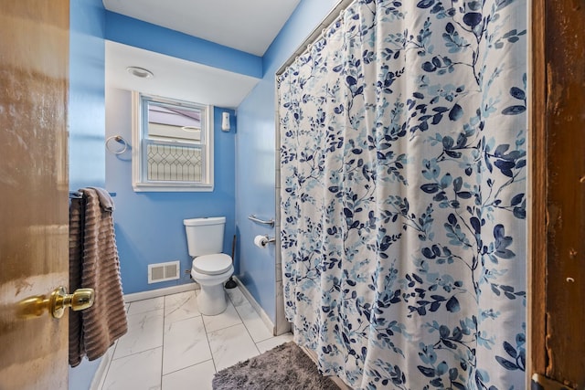 bathroom featuring curtained shower, toilet, visible vents, baseboards, and marble finish floor