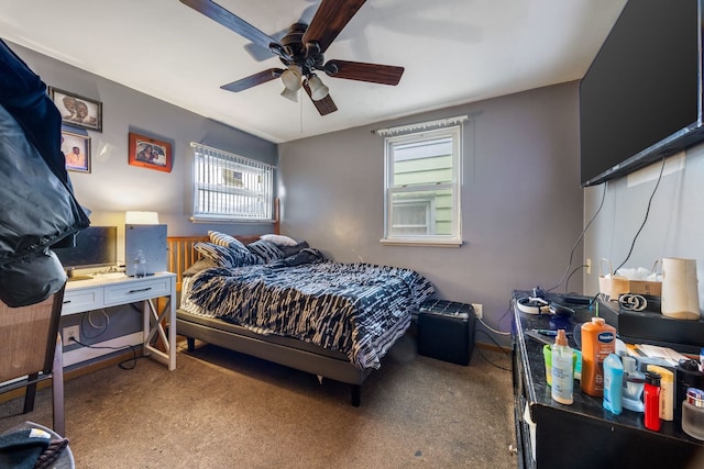 carpeted bedroom featuring a ceiling fan