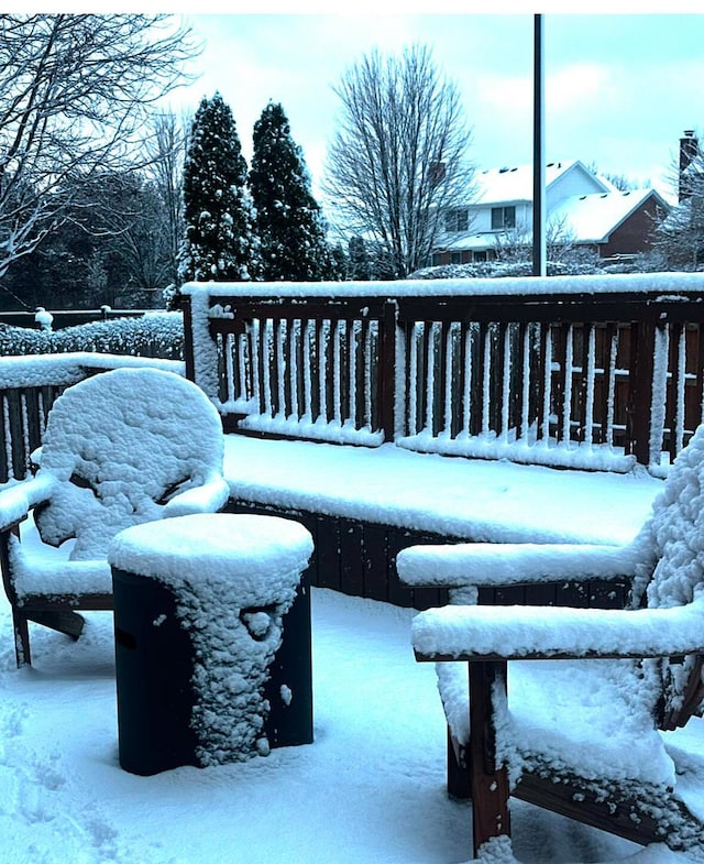 view of snow covered deck