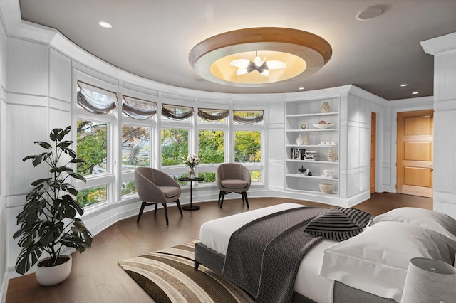 bedroom with recessed lighting and dark wood-style flooring