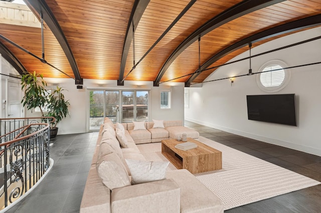 living room featuring tile patterned flooring, wood ceiling, vaulted ceiling with beams, and baseboards