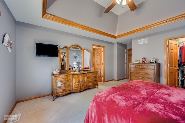 bedroom featuring light carpet, vaulted ceiling, visible vents, and baseboards