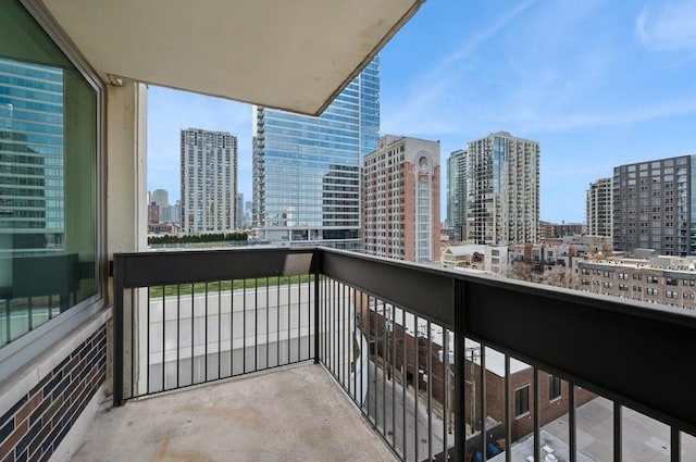 balcony featuring a city view