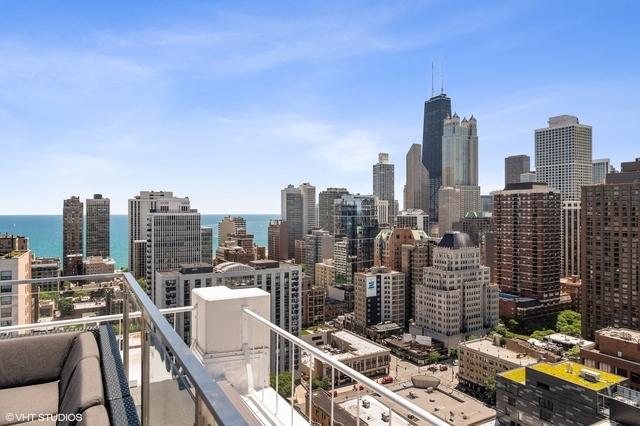 property's view of city with a water view