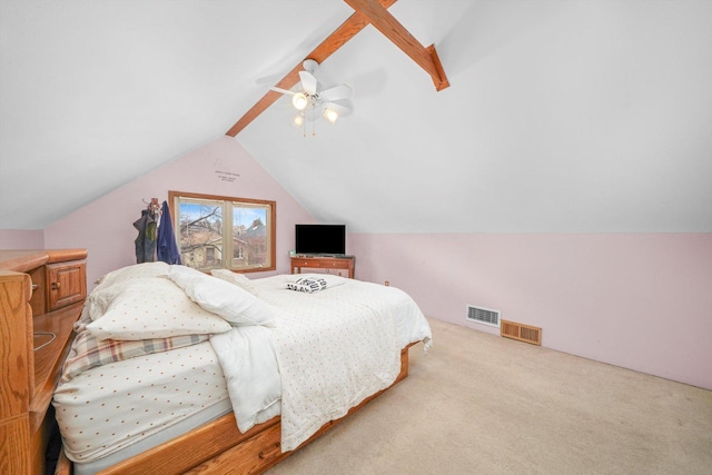 carpeted bedroom featuring lofted ceiling, ceiling fan, and visible vents