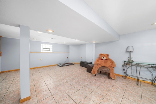 living area with light tile patterned floors, recessed lighting, and baseboards