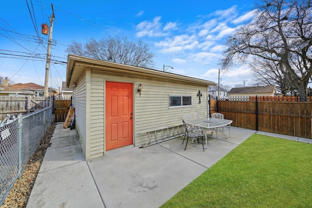 view of outbuilding with an outbuilding and a fenced backyard