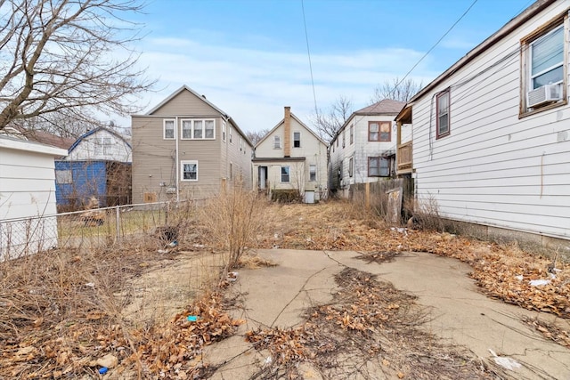 view of yard featuring cooling unit and fence