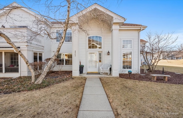 view of front of home with a front yard