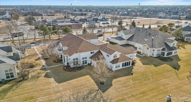 birds eye view of property with a residential view