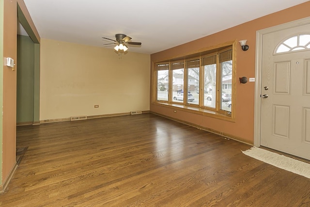 entrance foyer with plenty of natural light, visible vents, and wood finished floors