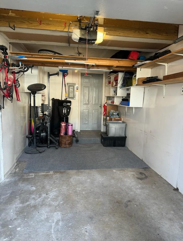 garage featuring a garage door opener