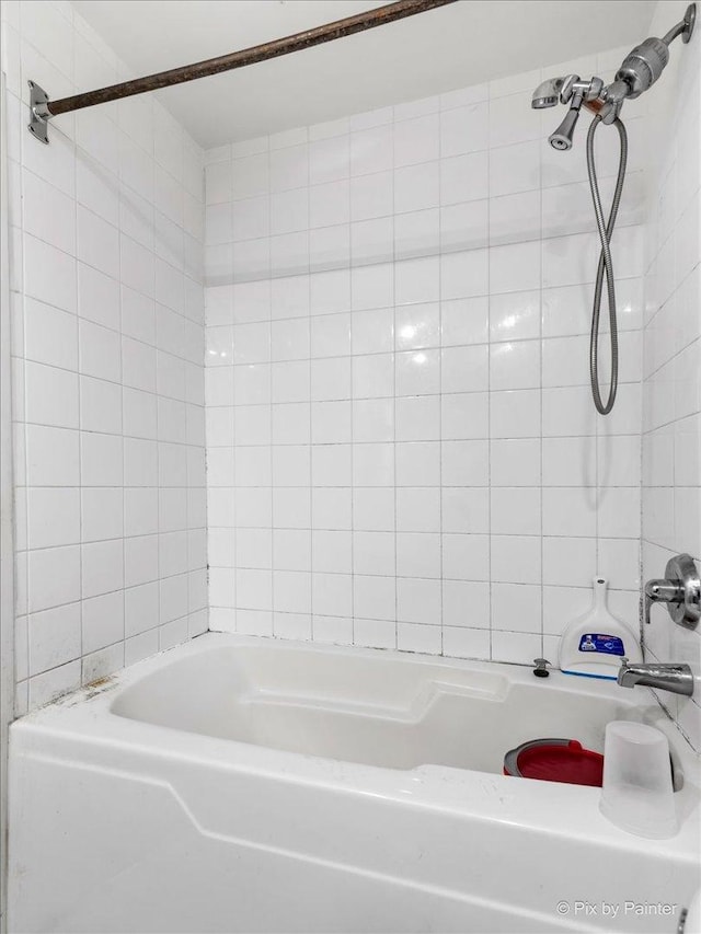 full bathroom with shower / bathtub combination