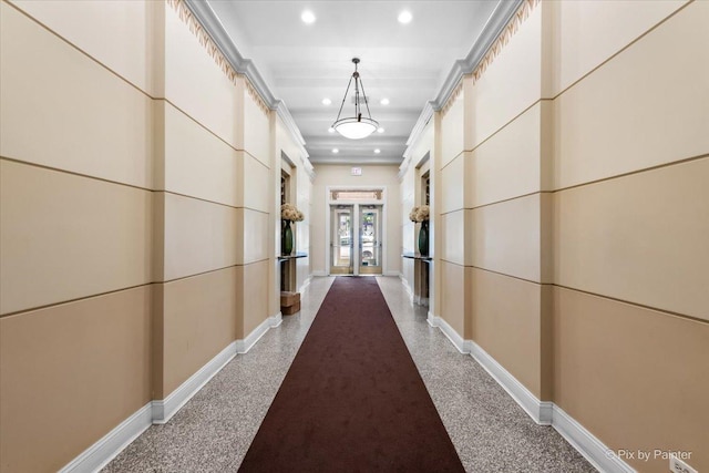 corridor with light speckled floor, french doors, recessed lighting, ornamental molding, and baseboards