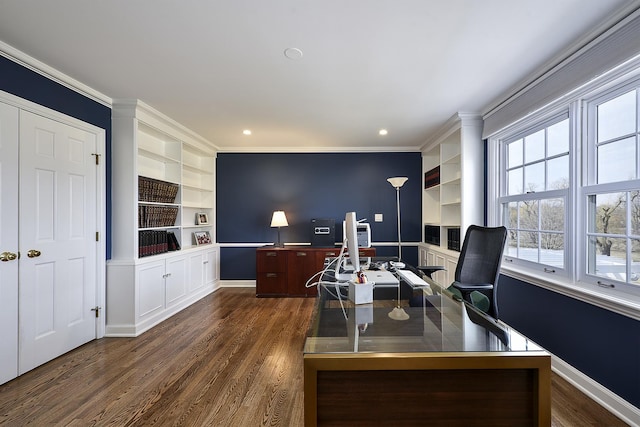 office space with built in shelves, baseboards, dark wood finished floors, and crown molding