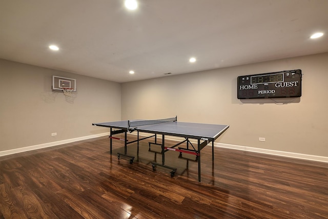 playroom featuring baseboards, dark wood finished floors, and recessed lighting