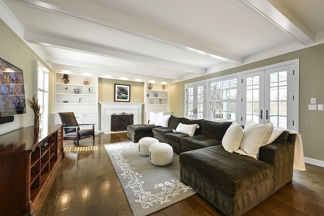 living area with dark wood-type flooring, french doors, a healthy amount of sunlight, and a fireplace