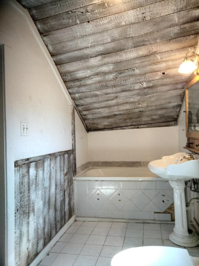 full bathroom featuring tiled tub, wood ceiling, tile patterned flooring, and vaulted ceiling