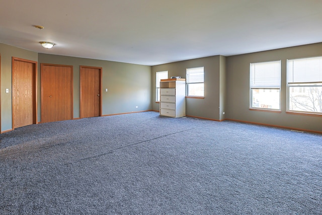 704 Doral Dr, Marengo, IL 60152 - carpeted spare room featuring baseboards