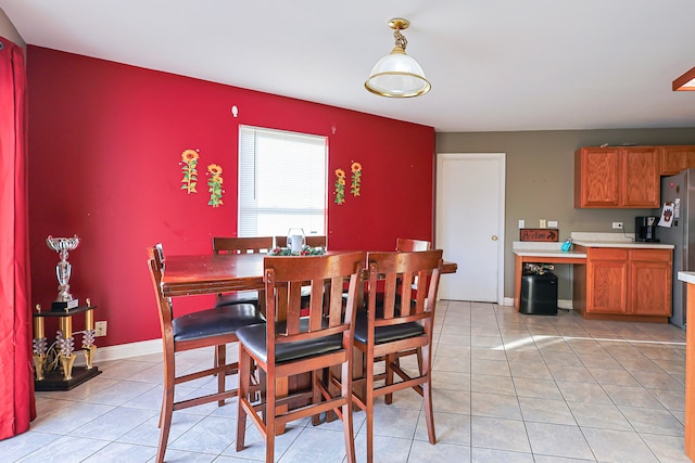704 Doral Dr, Marengo, IL 60152 - dining space with light tile patterned floors and baseboards