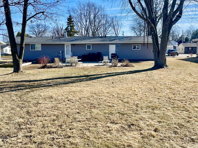 back of property featuring a patio area