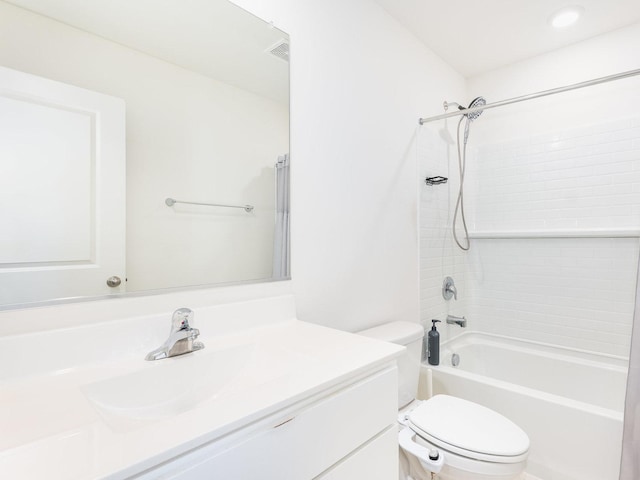 full bathroom with vanity, toilet, tub / shower combination, and visible vents