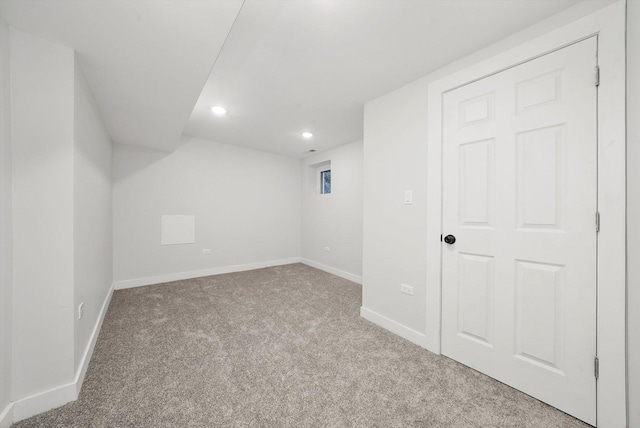 finished below grade area with recessed lighting, baseboards, and carpet floors