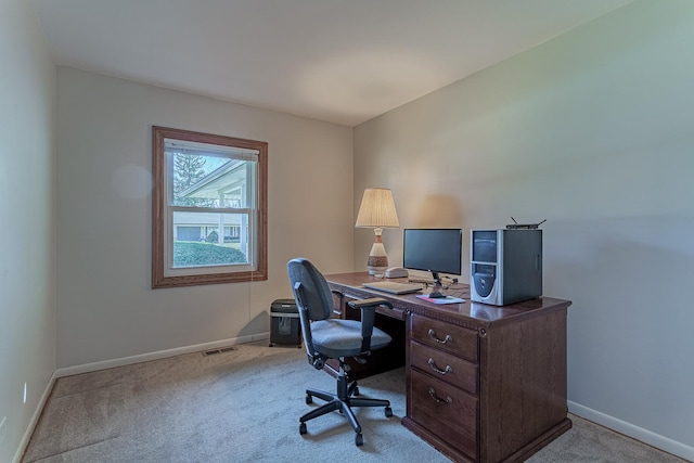 home office featuring carpet, visible vents, and baseboards