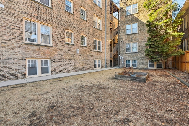 view of property featuring fence