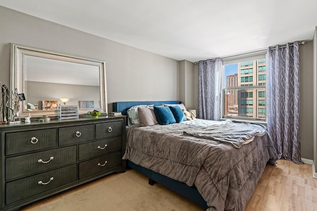 bedroom featuring light wood-type flooring