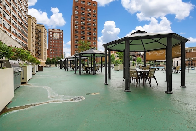 view of home's community featuring a gazebo and a view of city