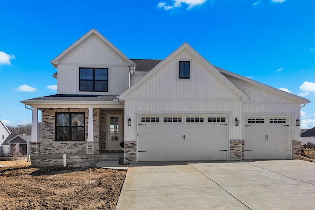 view of front of home with brick siding, board and batten siding, roof with shingles, driveway, and an attached garage