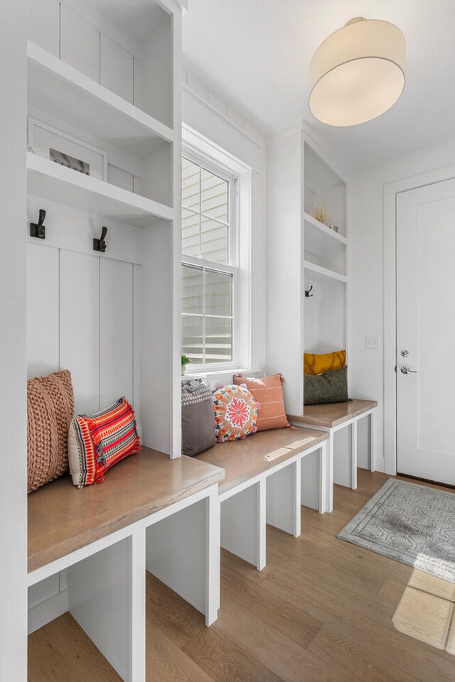 mudroom with wood finished floors