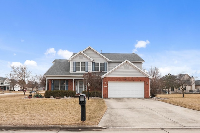 traditional home featuring brick siding, a front yard, roof with shingles, a garage, and driveway