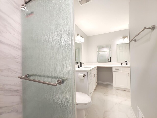 bathroom with marble finish floor, lofted ceiling, two vanities, visible vents, and a sink