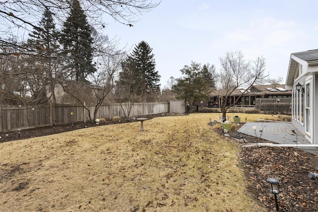 view of yard featuring a fenced backyard