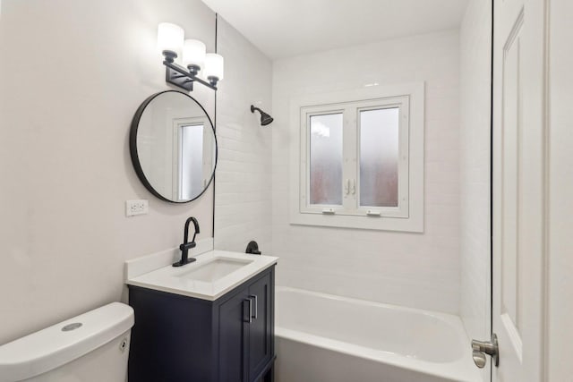 full bathroom with bathtub / shower combination, toilet, and vanity