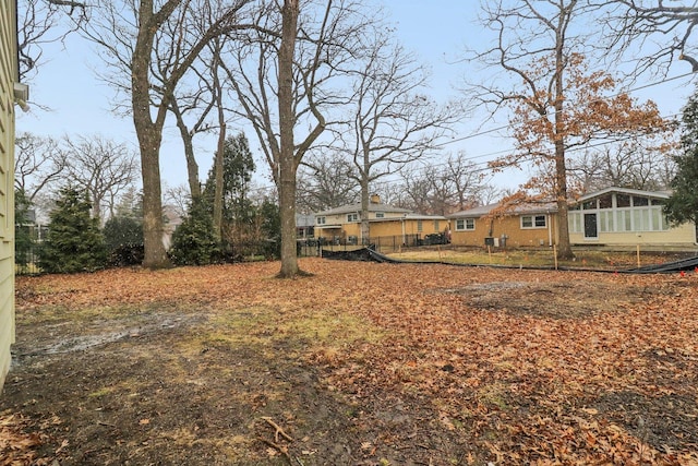 view of yard featuring fence