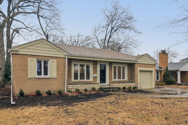 view of front of property with stone siding, roof with shingles, concrete driveway, a garage, and brick siding