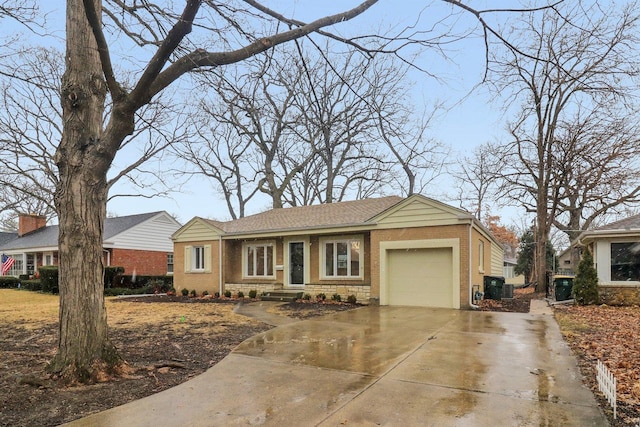 view of front of home with a garage, brick siding, cooling unit, and driveway